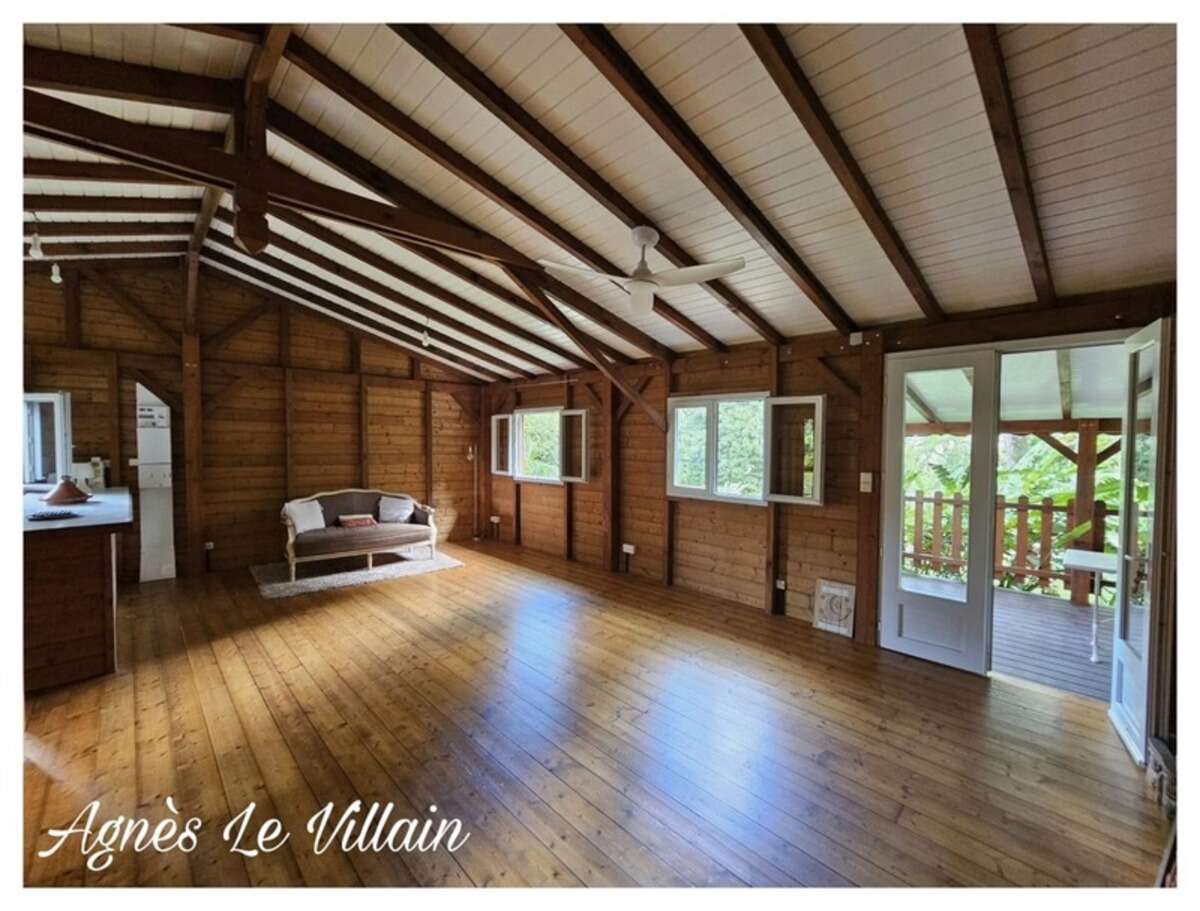 Maison en bois sur Terrain Arboré